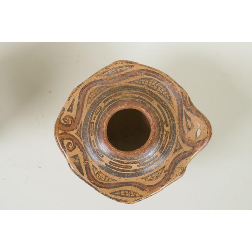 224 - A South American hand painted pottery censer, together with a similar South American pottery bottle,... 