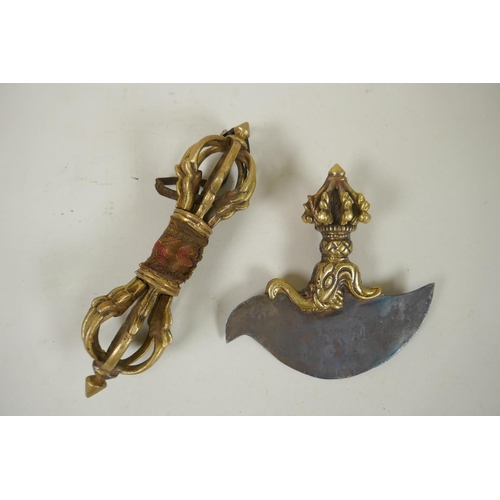 225 - A Tibetan bronze handled ceremonial kartika, and a bronze vajra, 17cm longest