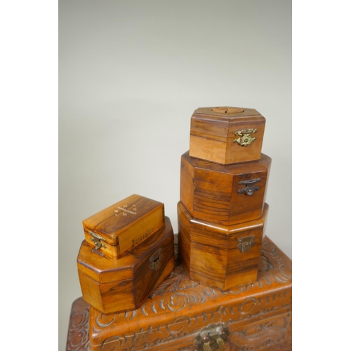 234 - A collection of C19th/C20th Burmese and Chinese carved camphor wood and hardwood trinket boxes decor... 