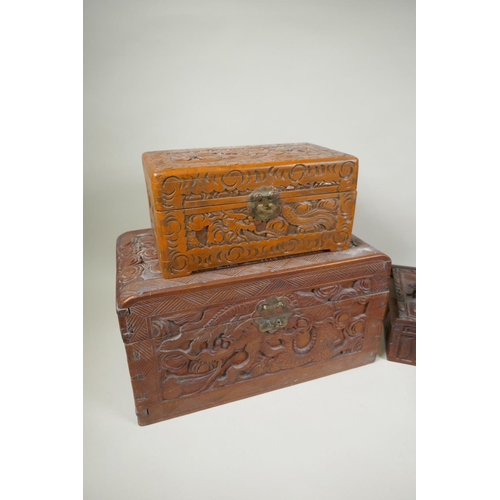 234 - A collection of C19th/C20th Burmese and Chinese carved camphor wood and hardwood trinket boxes decor... 