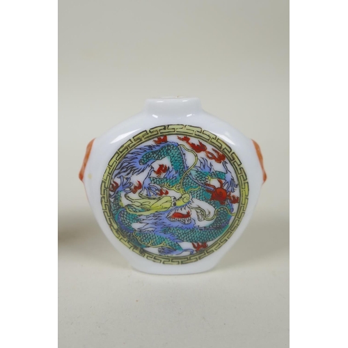 251 - A Chinese cinnabar lacquer style snuff bottle with riverside landscape decoration, Qianlong mark to ... 