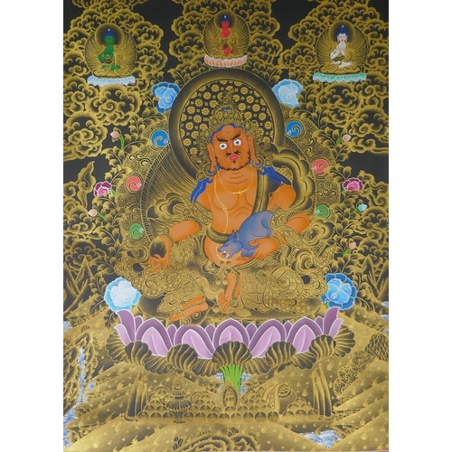 255 - A Tibetan painted thangka depicting Jambhala, in a silk mount, 82 x 126cm