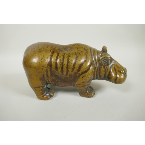 260 - A filled bronze hippopotamus, 21cm long