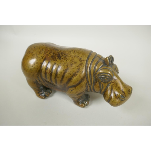 260 - A filled bronze hippopotamus, 21cm long