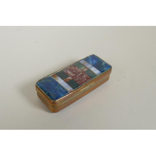 27 - An antique brass snuff box with specimen stone set lid and jasper set base, together with a brass an... 