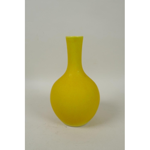 273 - A Chinese yellow ground porcelain bottle vase, KangXi 4 character mark to base, 17cm high