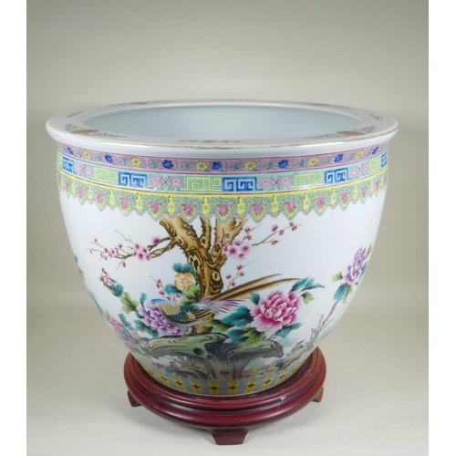 28 - A Chinese famille rose porcelain fish bowl, with enamel decoration of birds, flowers and auspicious ... 