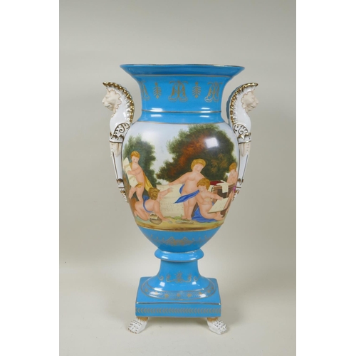 282 - A Sevres style blue ground porcelain vase with two lion head handles and decorative panels depicting... 