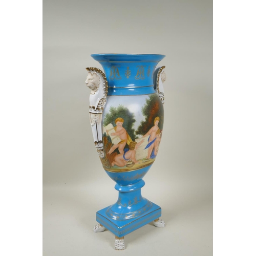 282 - A Sevres style blue ground porcelain vase with two lion head handles and decorative panels depicting... 