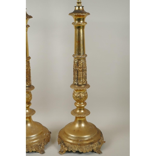 290 - A pair of Empire style gilt metal column table lamps, 85cm high