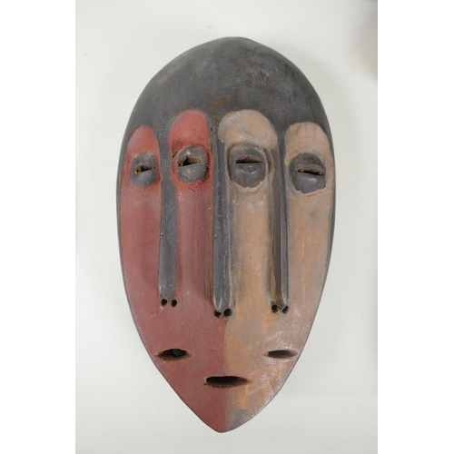 34 - A collection of tribal masks to include a Mali Marka mask, a Congolese Lega peoples mask, a Congoles... 