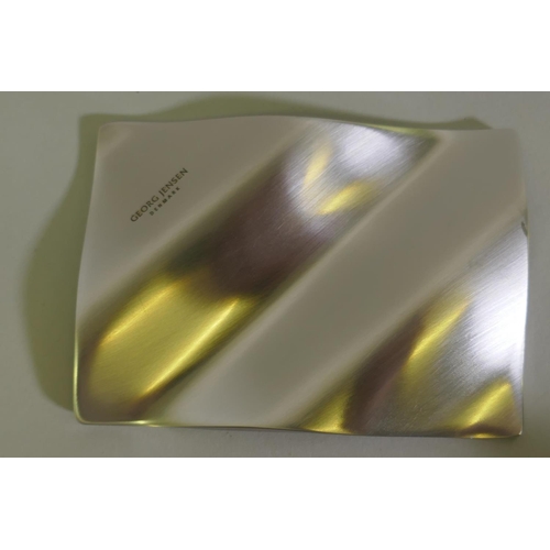 35 - A Georg Jensen Wave paperweight, designed by Steve McGugan, in original box