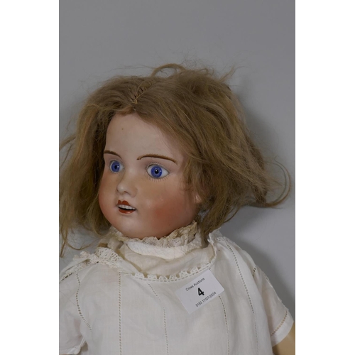 4 - A Jules Verlingue Petite Francaise porcelain head doll, with jointed composition body, head marked J... 