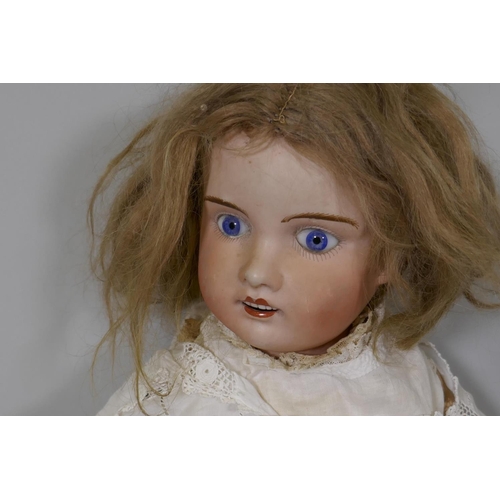 4 - A Jules Verlingue Petite Francaise porcelain head doll, with jointed composition body, head marked J... 