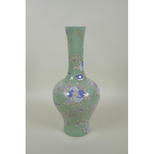 40 - A Chinese celadon crackle glazed porcelain yen yen vase with blue and white bird and pomegranate dec... 