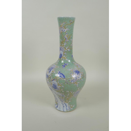 40 - A Chinese celadon crackle glazed porcelain yen yen vase with blue and white bird and pomegranate dec... 