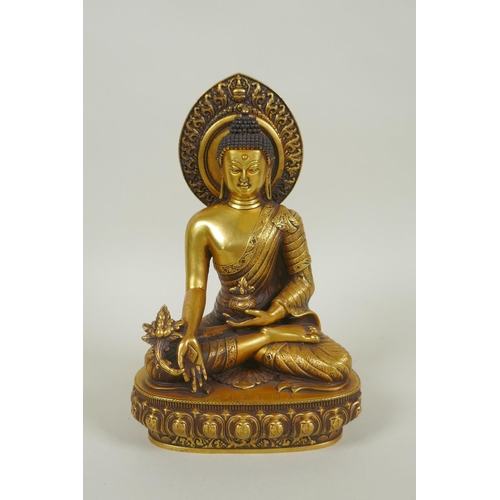 43 - A Sino Tibetan filled gilt bronze figure of Buddha, double vajra mark to base, and inscribed with Yo... 