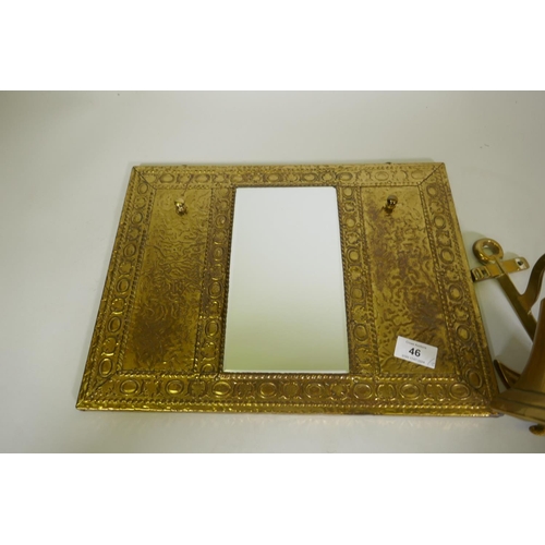 46 - A brass hall mirror with hooks and ship's bell, 22cm long