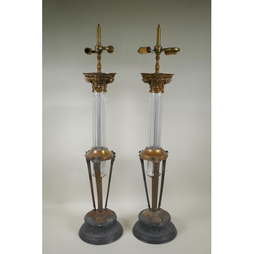 47 - A pair of glass column table lamps with brass mounts, 79cm high