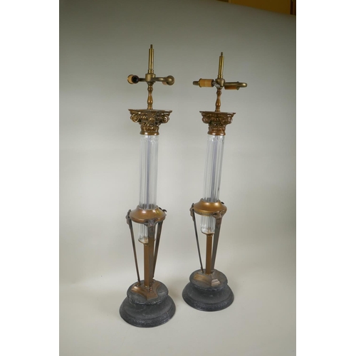 47 - A pair of glass column table lamps with brass mounts, 79cm high