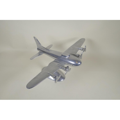 51 - A vintage aluminium model of a four engine bomber, Wingspan, 49cm