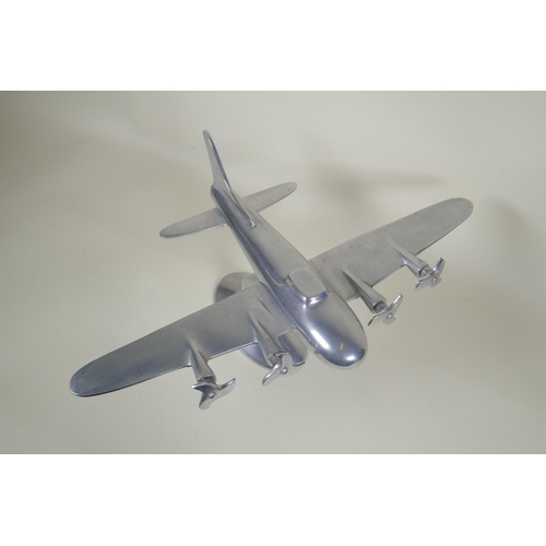 51 - A vintage aluminium model of a four engine bomber, Wingspan, 49cm