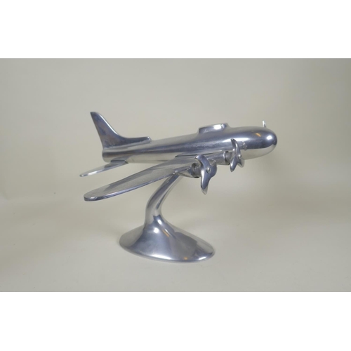 51 - A vintage aluminium model of a four engine bomber, Wingspan, 49cm