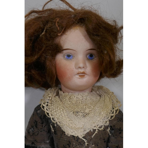 6 - An early C20th French porcelain head doll with composition body, the head marked SFBJ 60 Paris 8/0, ... 