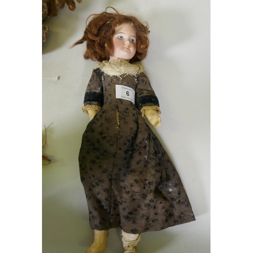 6 - An early C20th French porcelain head doll with composition body, the head marked SFBJ 60 Paris 8/0, ... 