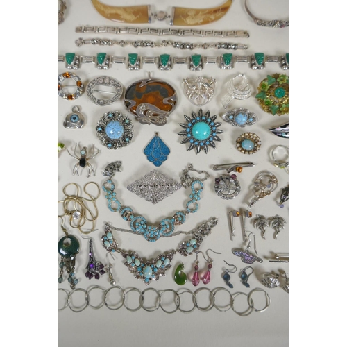 602 - A collection of good quality silver, white metal and gilt metal costume jewellery including brooches... 