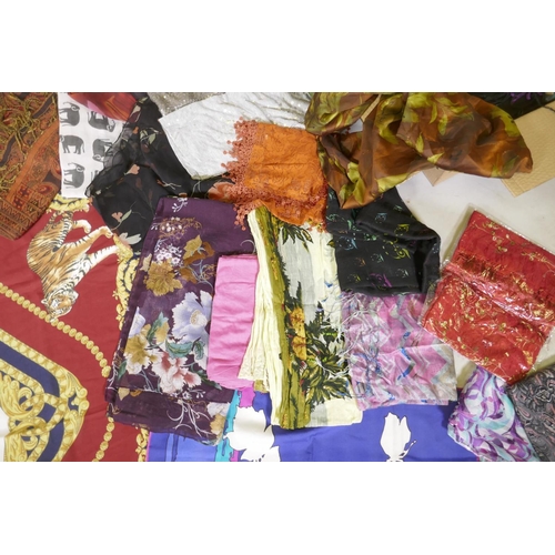 62 - A large quantity of silk, linen, lace and other decorative scarves