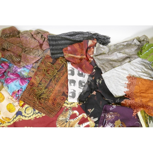 62 - A large quantity of silk, linen, lace and other decorative scarves