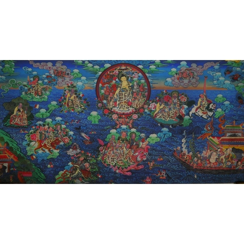 64 - An extensive Tibetan printed thangka depicting Shakyamuni Buddha, 90 x 45cm