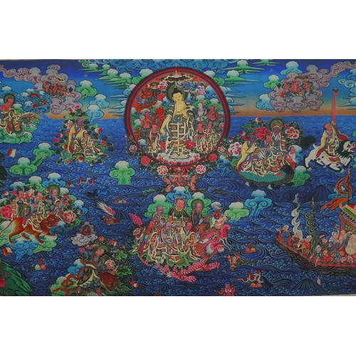 64 - An extensive Tibetan printed thangka depicting Shakyamuni Buddha, 90 x 45cm