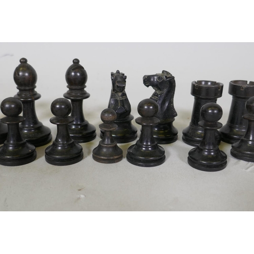 66 - Set of boxwood and ebony chess pieces, possibly K & C, king 8cm high, one pawn replaced