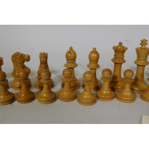 66 - Set of boxwood and ebony chess pieces, possibly K & C, king 8cm high, one pawn replaced