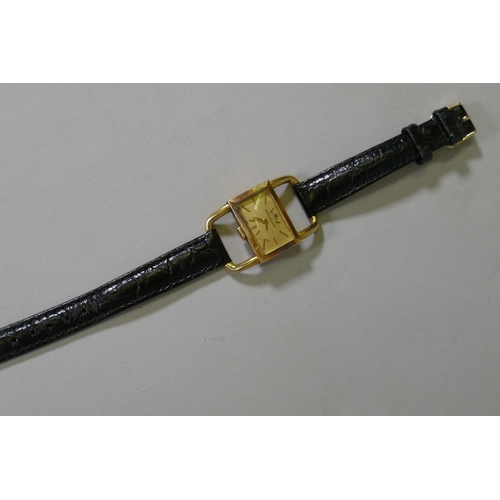 673 - A vintage Jaeger-Le Coultre Hermes Etrier gold plated lady's watch with leather strap