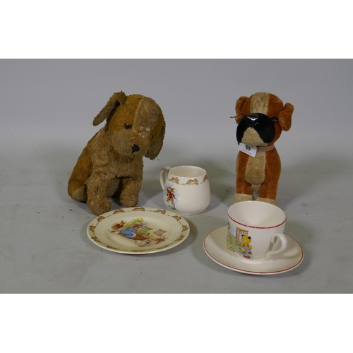 69 - A vintage stuffed plush toy dog with swivel head and a Merrythought dog, a Bunnykins mug and plate, ... 