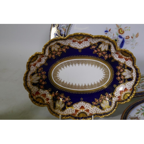 75 - Minton Canton pattern serving plates and tureens, and a Spode Imari pattern shaped bowl, largest 41c... 