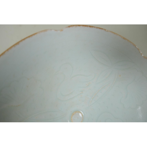 8 - An antique Chinese celadon glazed fine porcelain bowl with shaped rim and incised decoration of duck... 