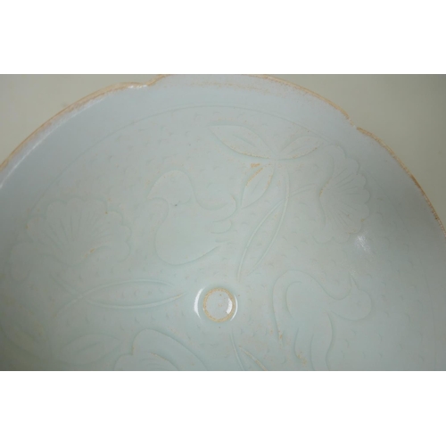 8 - An antique Chinese celadon glazed fine porcelain bowl with shaped rim and incised decoration of duck... 