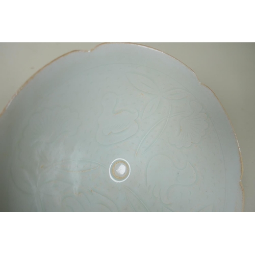 8 - An antique Chinese celadon glazed fine porcelain bowl with shaped rim and incised decoration of duck... 