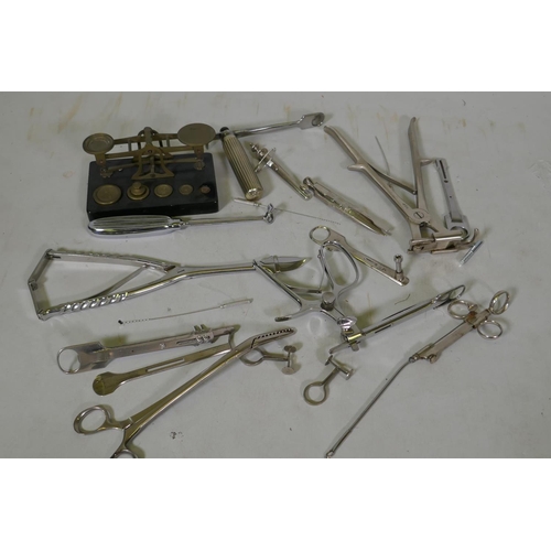 87 - A set of E. Mordan & Co scales and weights and various surgical instruments