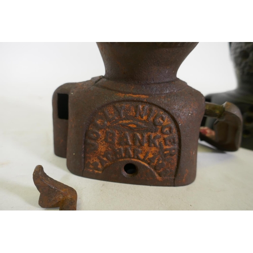 88 - A C19th cast iron money box, AF, and another similar, largest 17cm high