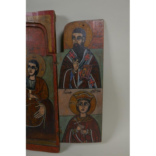 897 - An C18th/C19th Greek Orthodox triptych icon, 18 x 28cm, 36 x 28cm unfolded