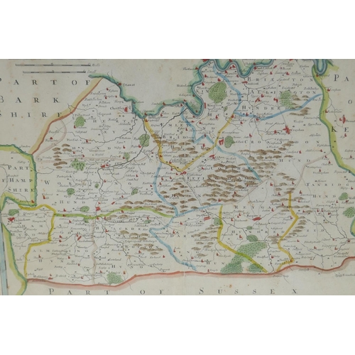 911 - A C17th/C18th hand coloured map of Surrey by Robert Morden, (British, 1650-1703), 42 x 36cm