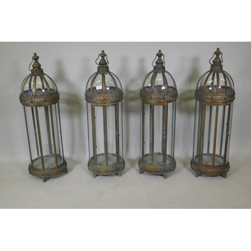 92 - Four gilt metal dome topped lanterns, 90cm high