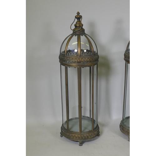 92 - Four gilt metal dome topped lanterns, 90cm high