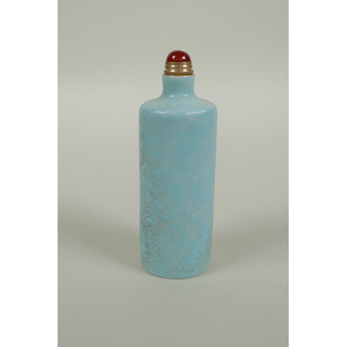 93 - A Chinese turquoise glazed porcelain cylinder snuff bottle with allover floral decoration, 2 charact... 