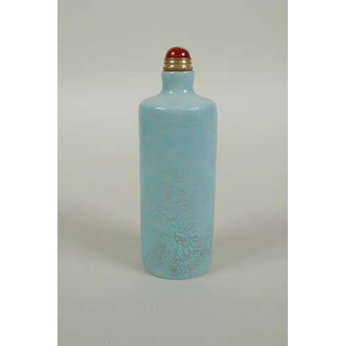 93 - A Chinese turquoise glazed porcelain cylinder snuff bottle with allover floral decoration, 2 charact... 